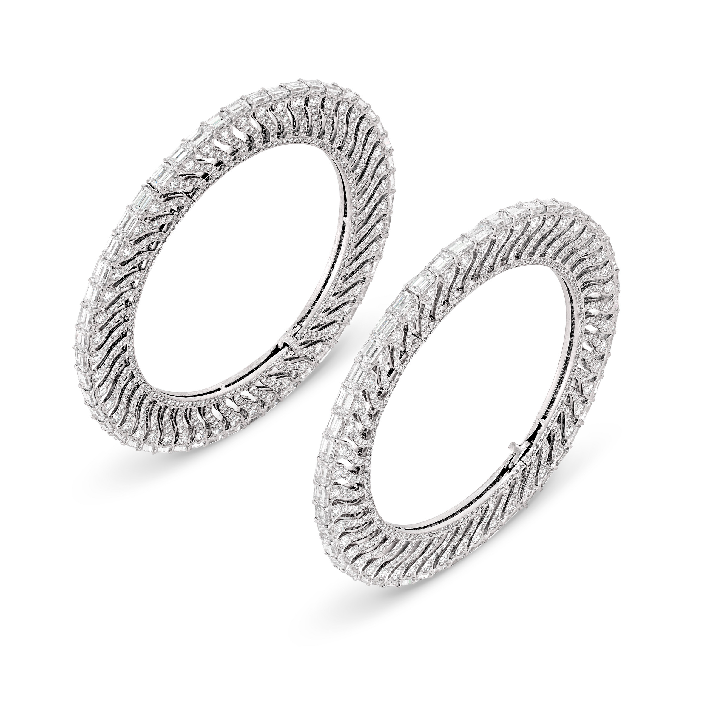 A pair of diamond bangles by Bhagat, offered in Magnificent Jewels Including the Bulgari Pink on 10 November 2026 at Christie's in Geneva