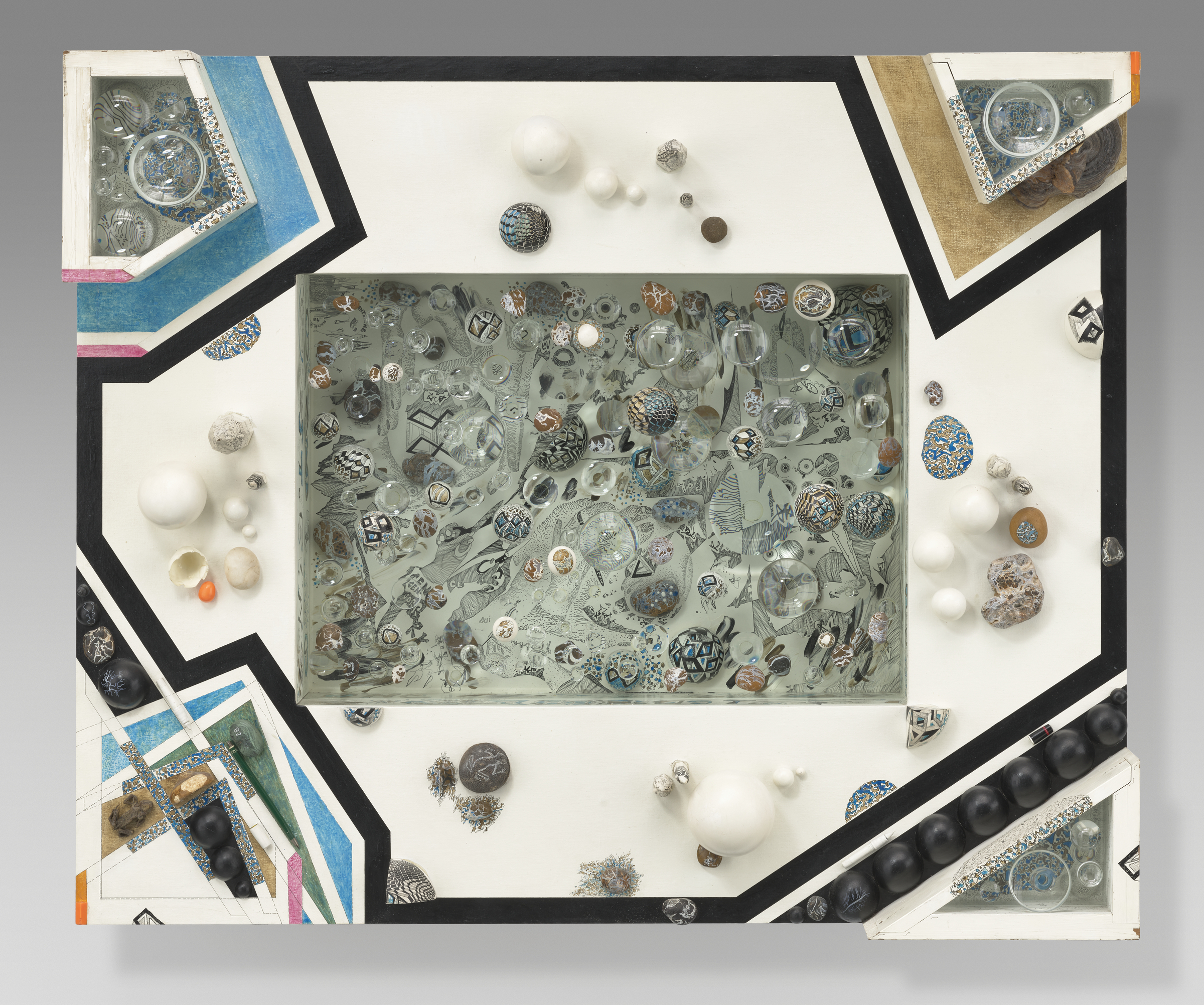 A geometric mixed-media artwork with various spheres, glass, and objects on a white background.