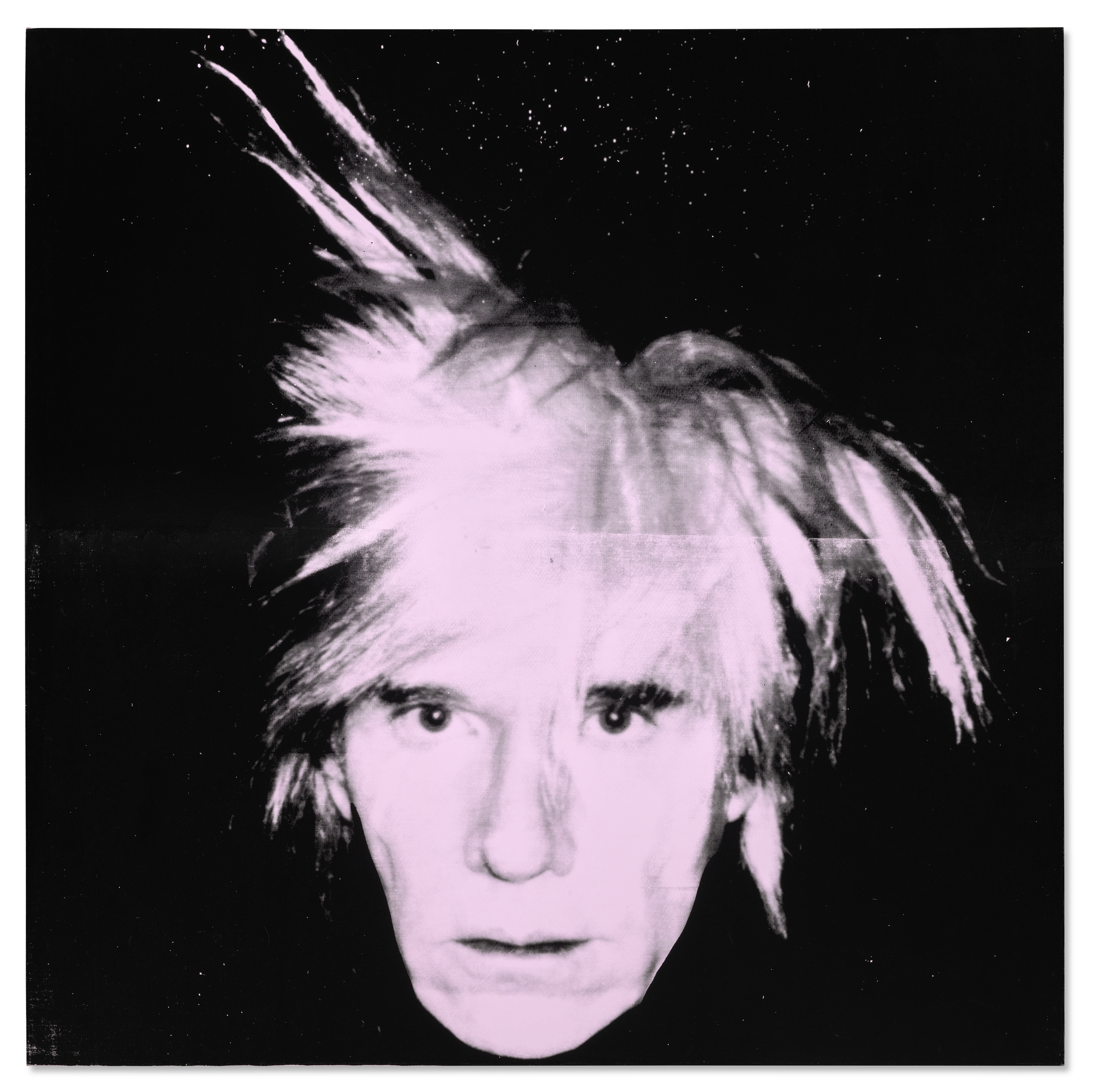 A black and white portrait of a person with wild, spiky hair against a dark background.