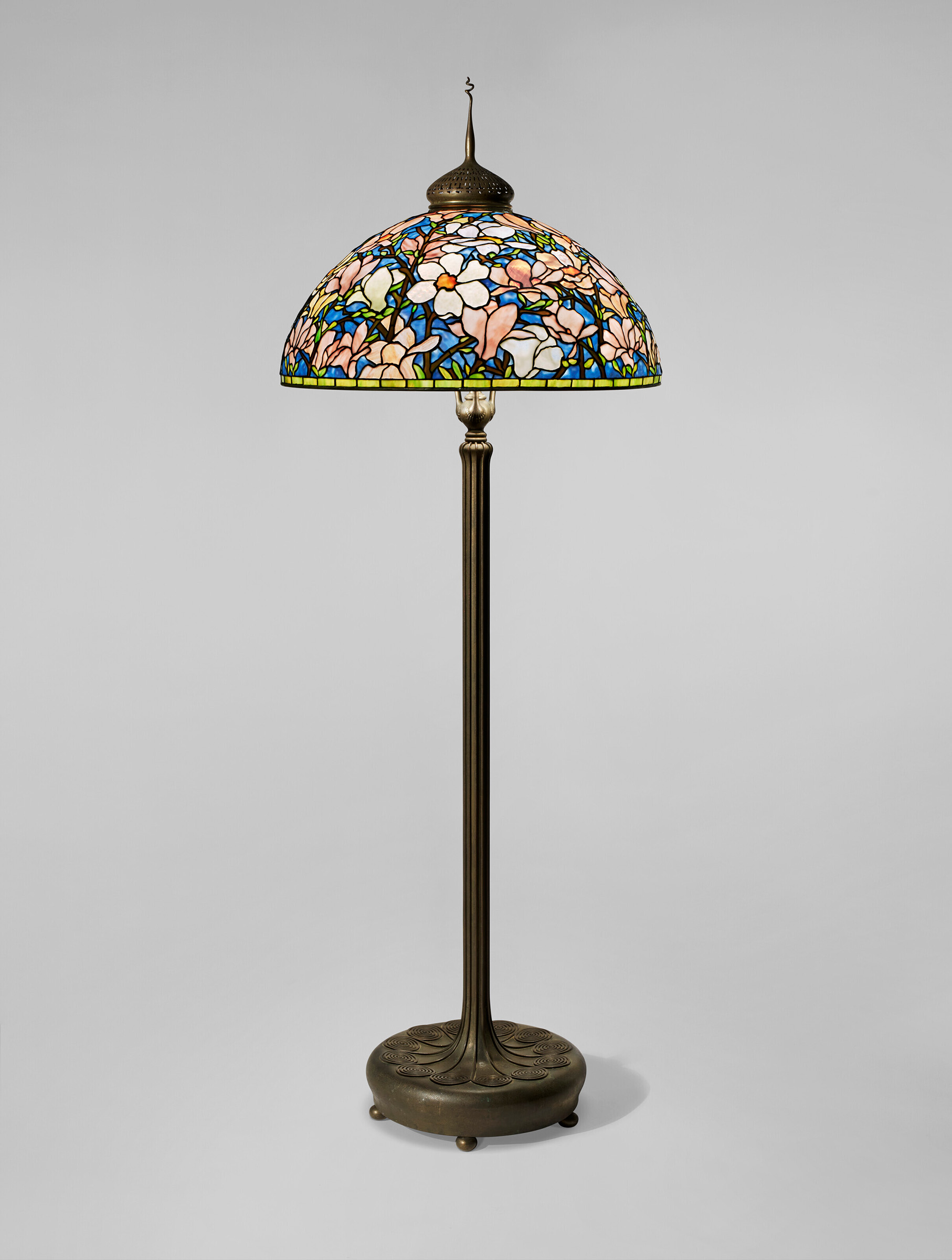 Tiffany Studios, ‘Magnolia’ floor lamp, 1920. Leaded glass, patinated bronze. 78 in (198.1 cm) high, 28 in (71.1 cm) diameter of shade. Sold for $630,000 in Tiffany on 9 December 2022 at Christie’s New York