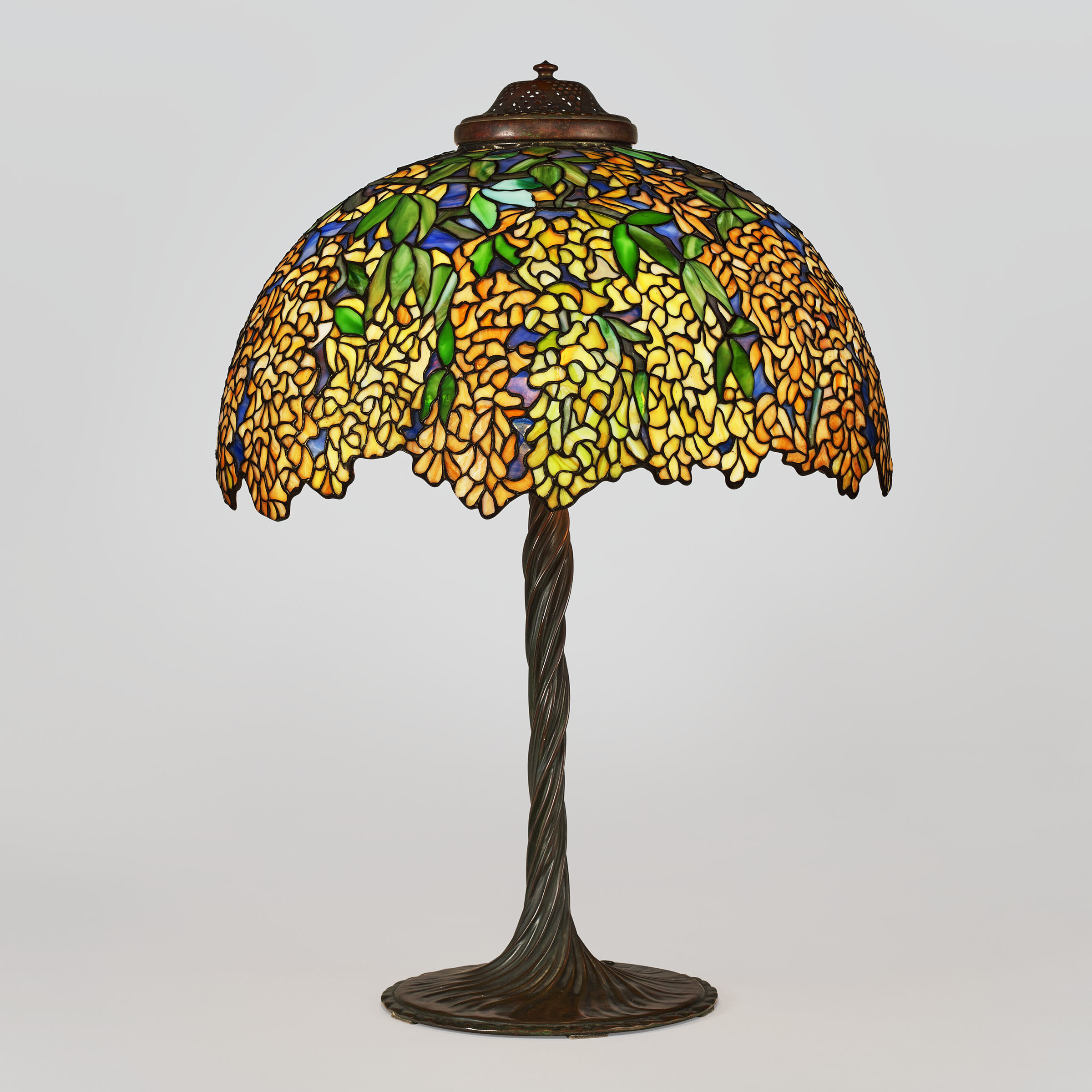 Tiffany Studios, a Laburnum table lamp with a Twisted Vine base, circa 1918, sold for $214,200 on 11 March at Christie's Online