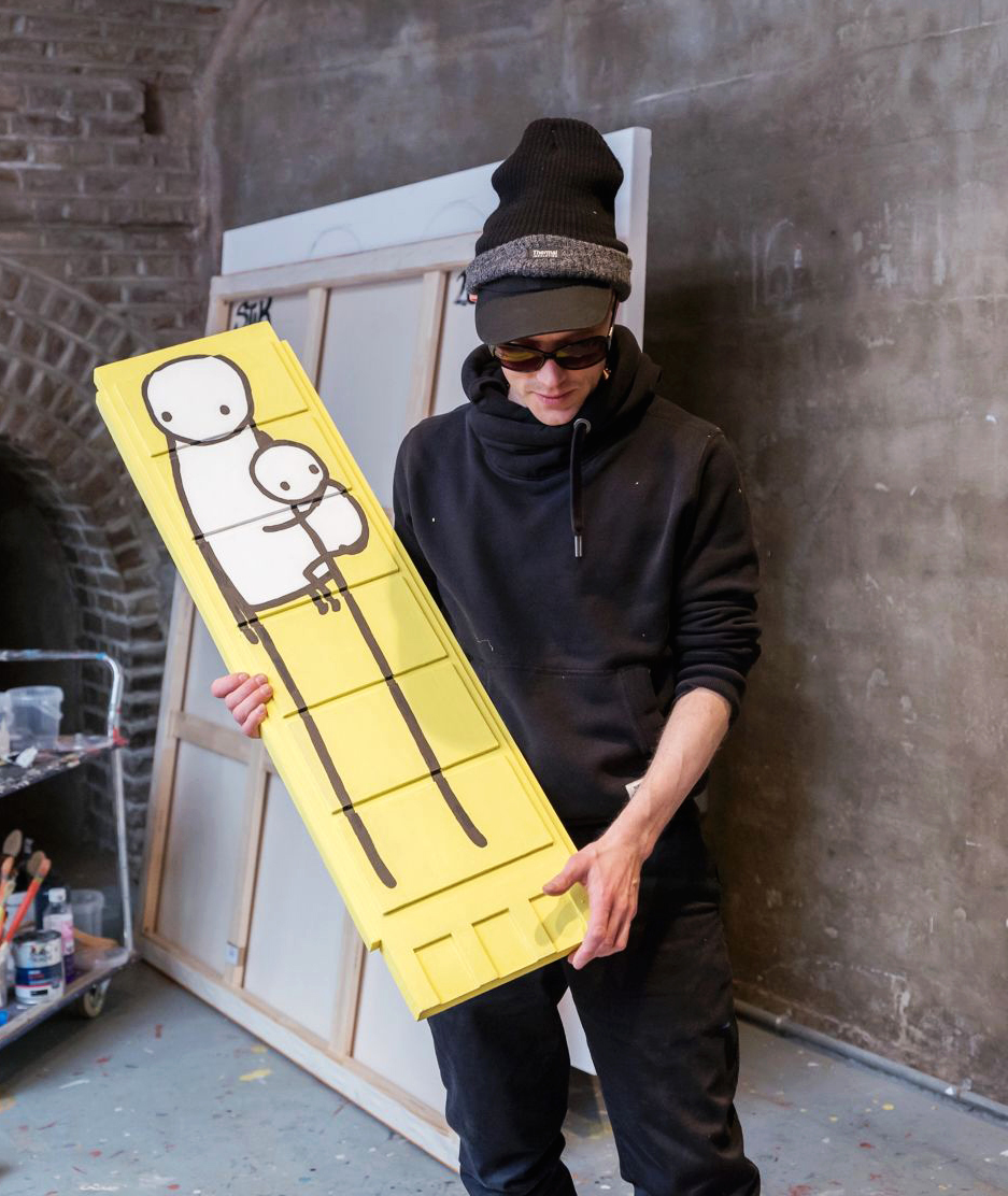 Stik in his studio with Little Big Mother. The work sold for £52,500 at Christie’s London on 28 March 2018