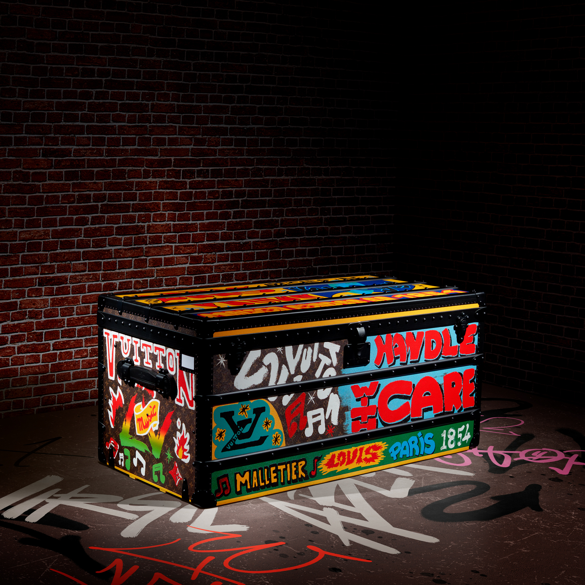 A limited edition painted Monogram Courrier Lozine trunk 110 with black hardware by Virgil Abloh. Dimensions: 110 w x 51 h x 55 d cm. Sold for HK$630,000 in Handbags and Accessories sale on 26 November 2022 at Christie’s in Hong Kong