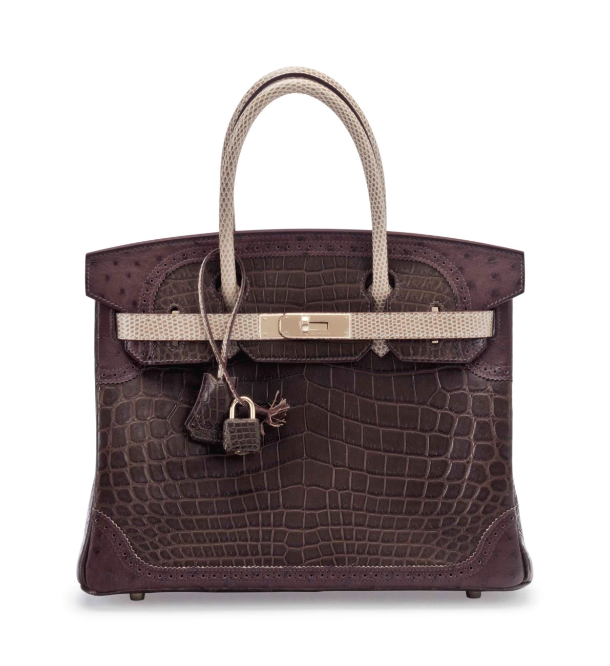 A luxury brown crocodile leather handbag with beige handles and gold hardware.