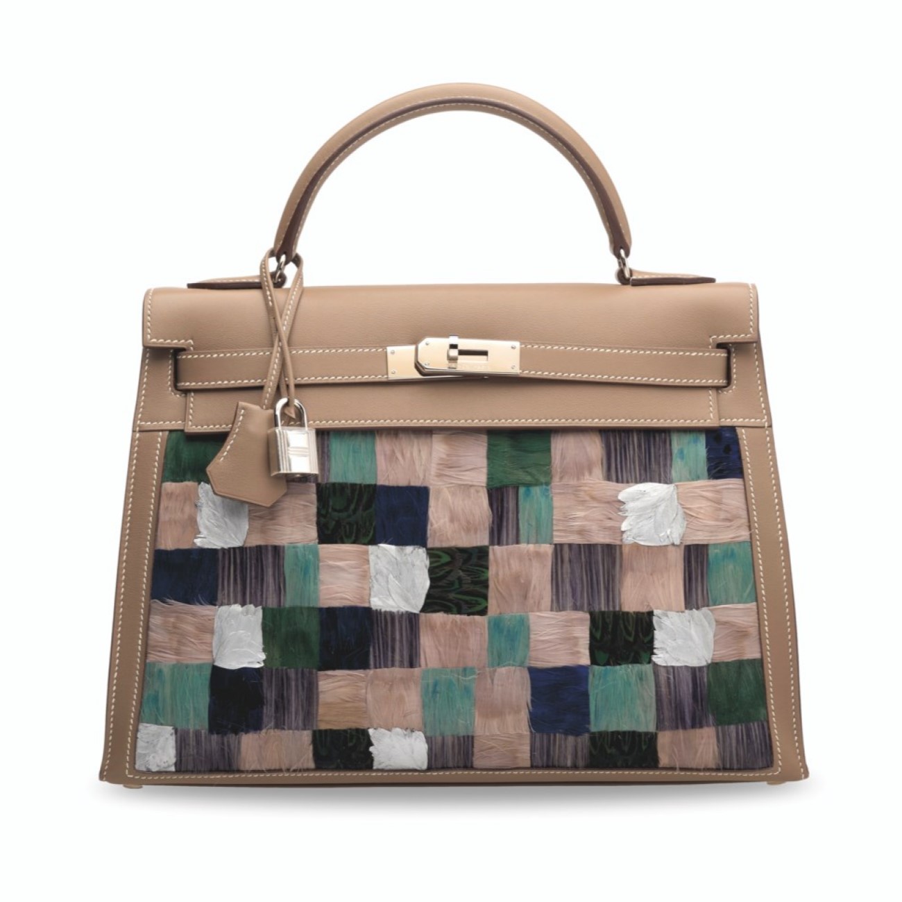 A tan handbag with a top handle and a multicolored patchwork front panel.