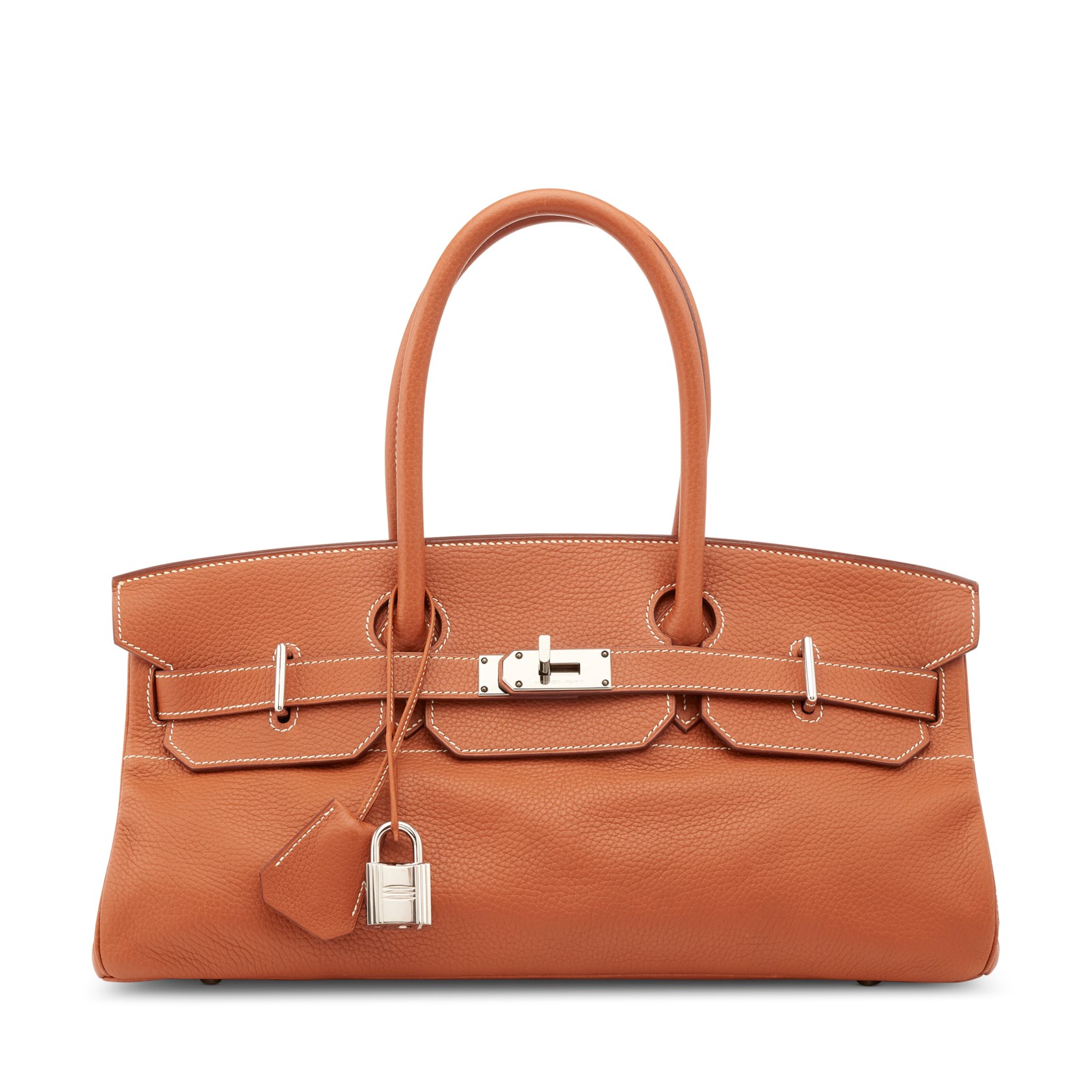 A brown leather handbag with silver hardware and a top handle.