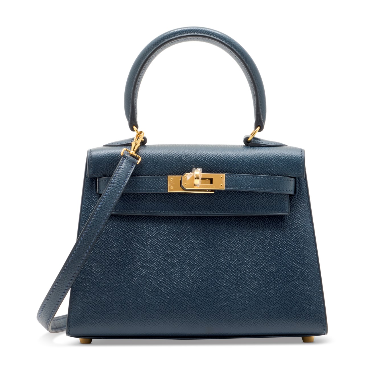 A blue leather handbag with a top handle, shoulder strap, and gold hardware.