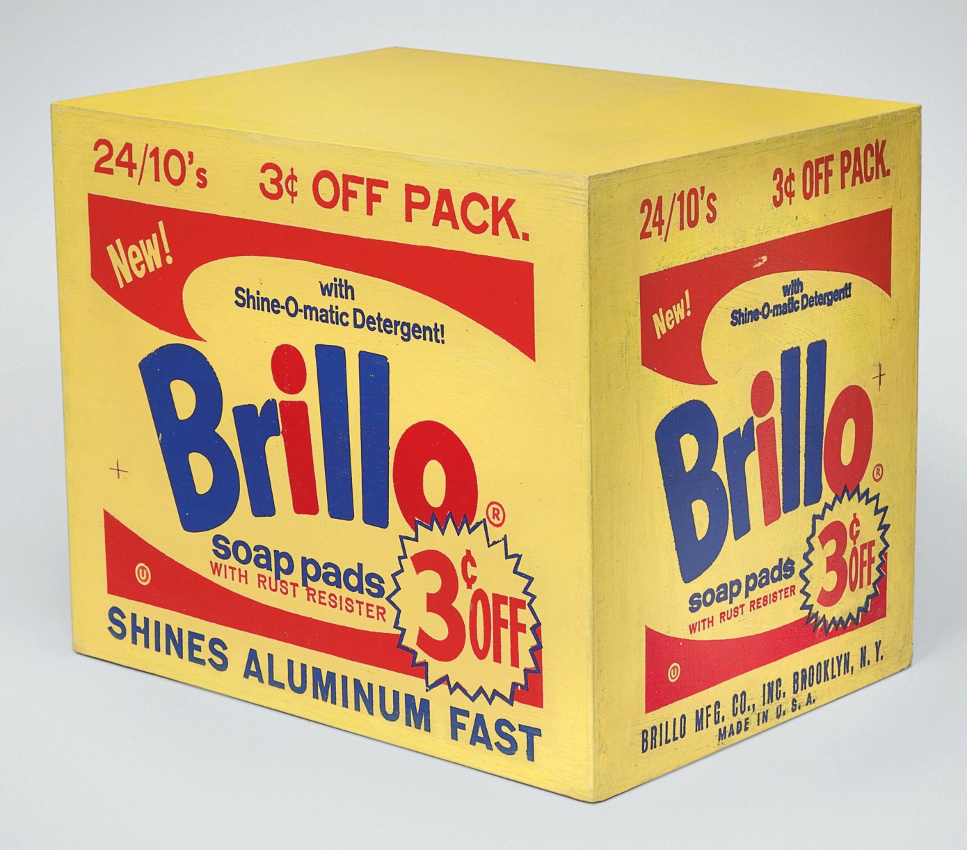 A yellow Brillo soap pads box with bold red and blue lettering and promotional offers.