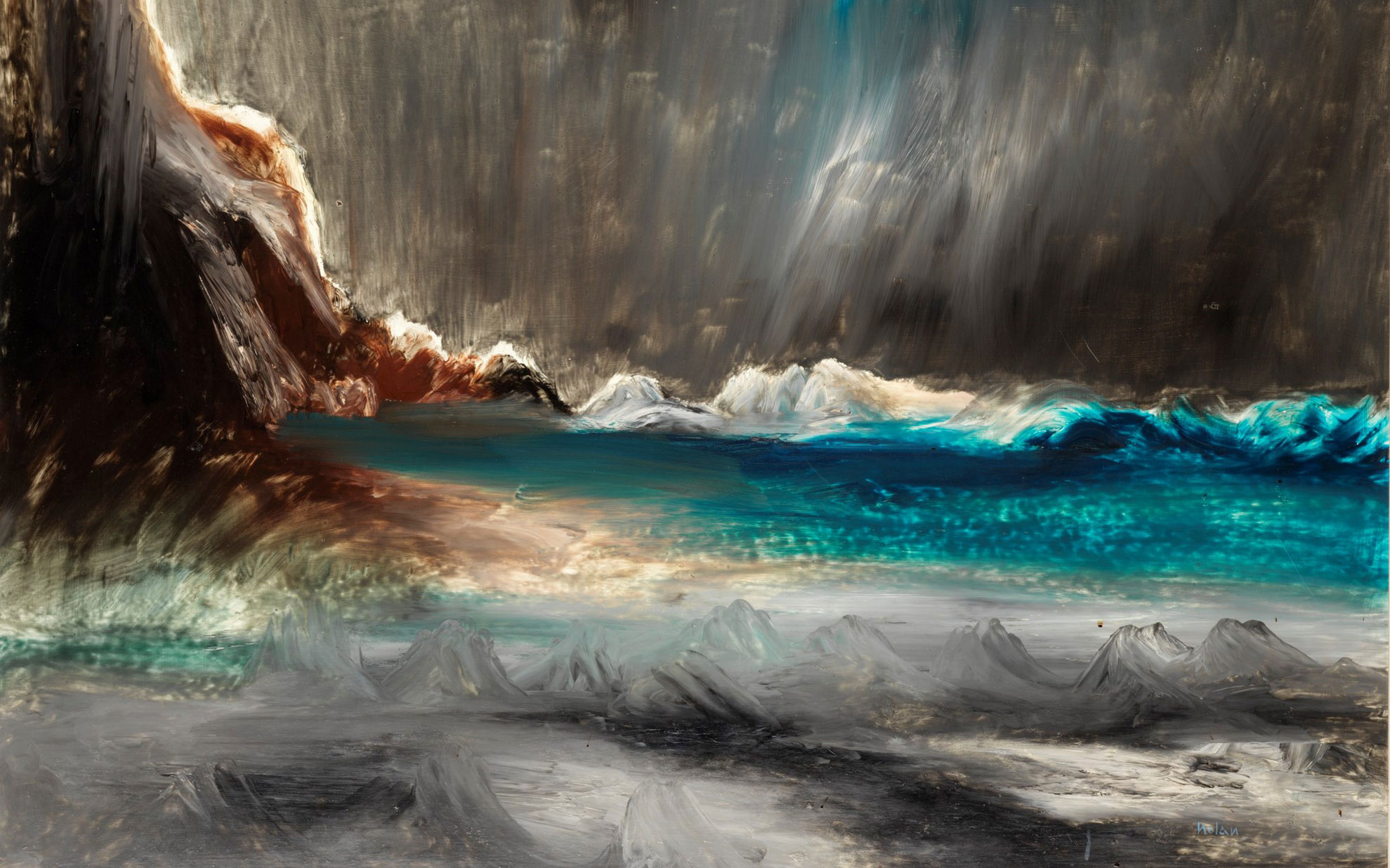 Dramatic seascape with vibrant blue waves crashing against cliffs under a stormy sky, fronted by tranquil mountains.