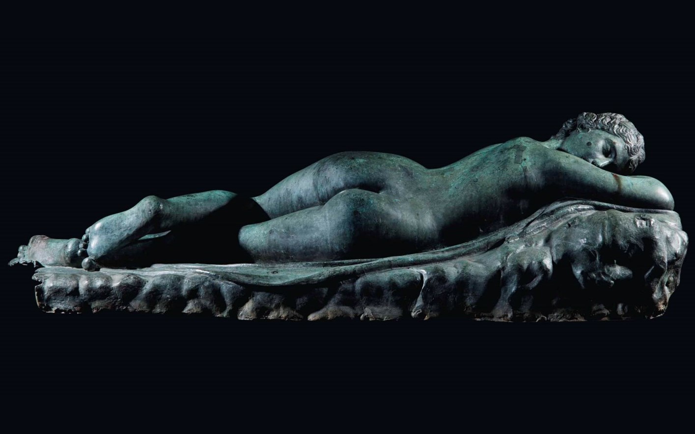 A BRONZE RECLINING FIGURE OF THE HERMAPHRODITE