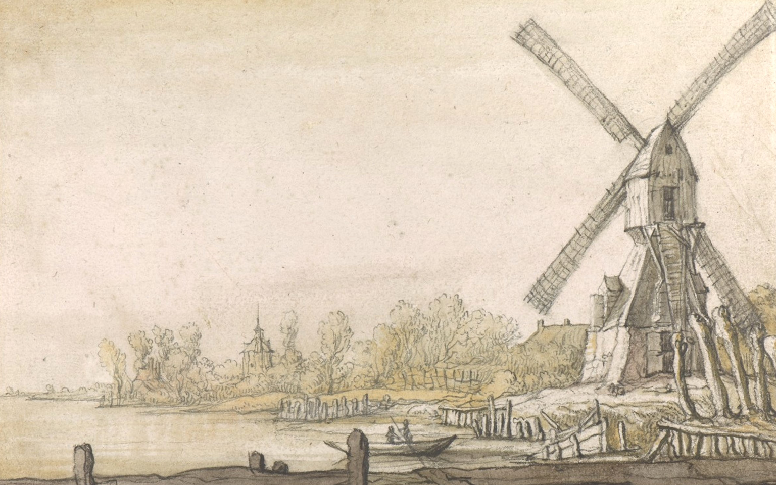 A windmill stands near a riverbank with trees and a small boat on the water.
