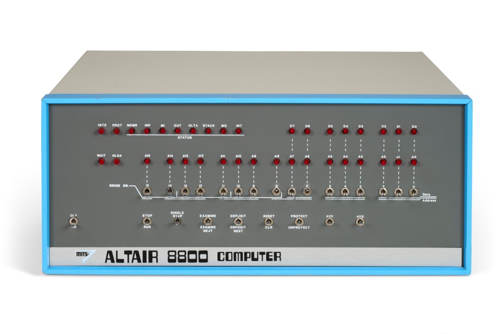A front view of the vintage Altair 8800 computer with switches and indicator lights.