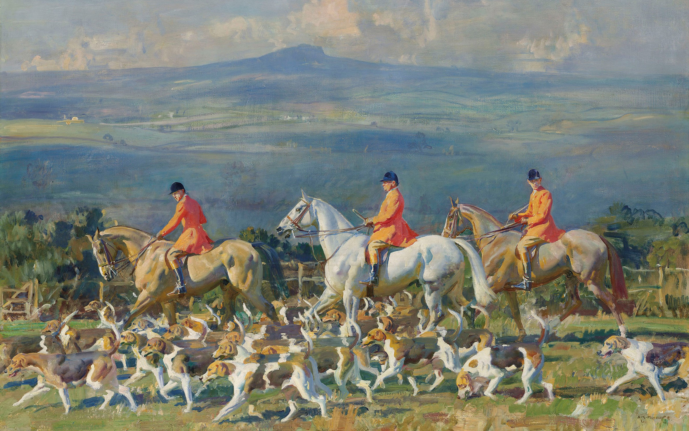 Three riders in bright red jackets on white horses lead a pack of hounds across a lush, rolling landscape.