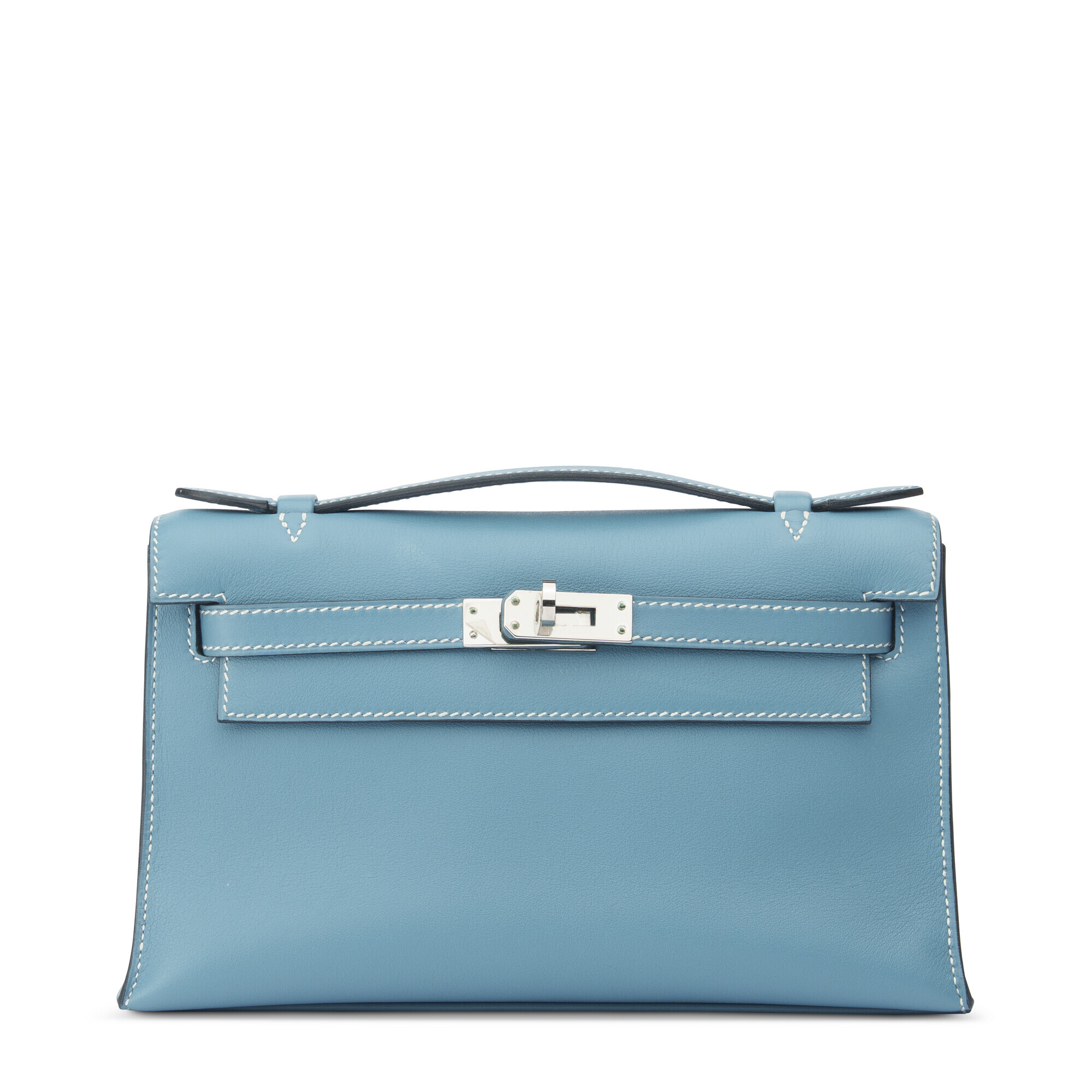 A blue leather handbag with white stitching and a silver clasp on the front.