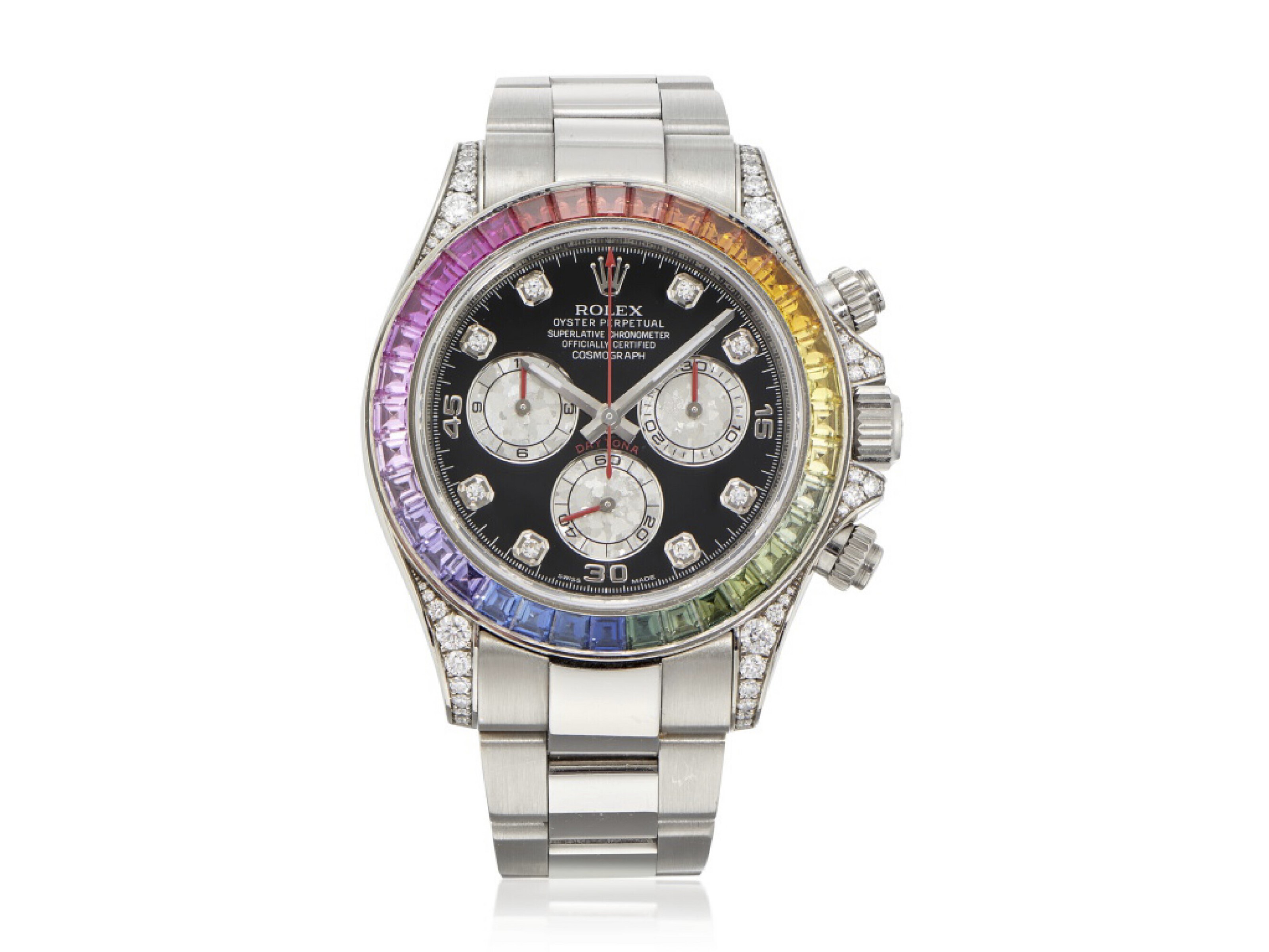 A luxury wristwatch with a rainbow-colored bezel and a black dial with diamond markers.