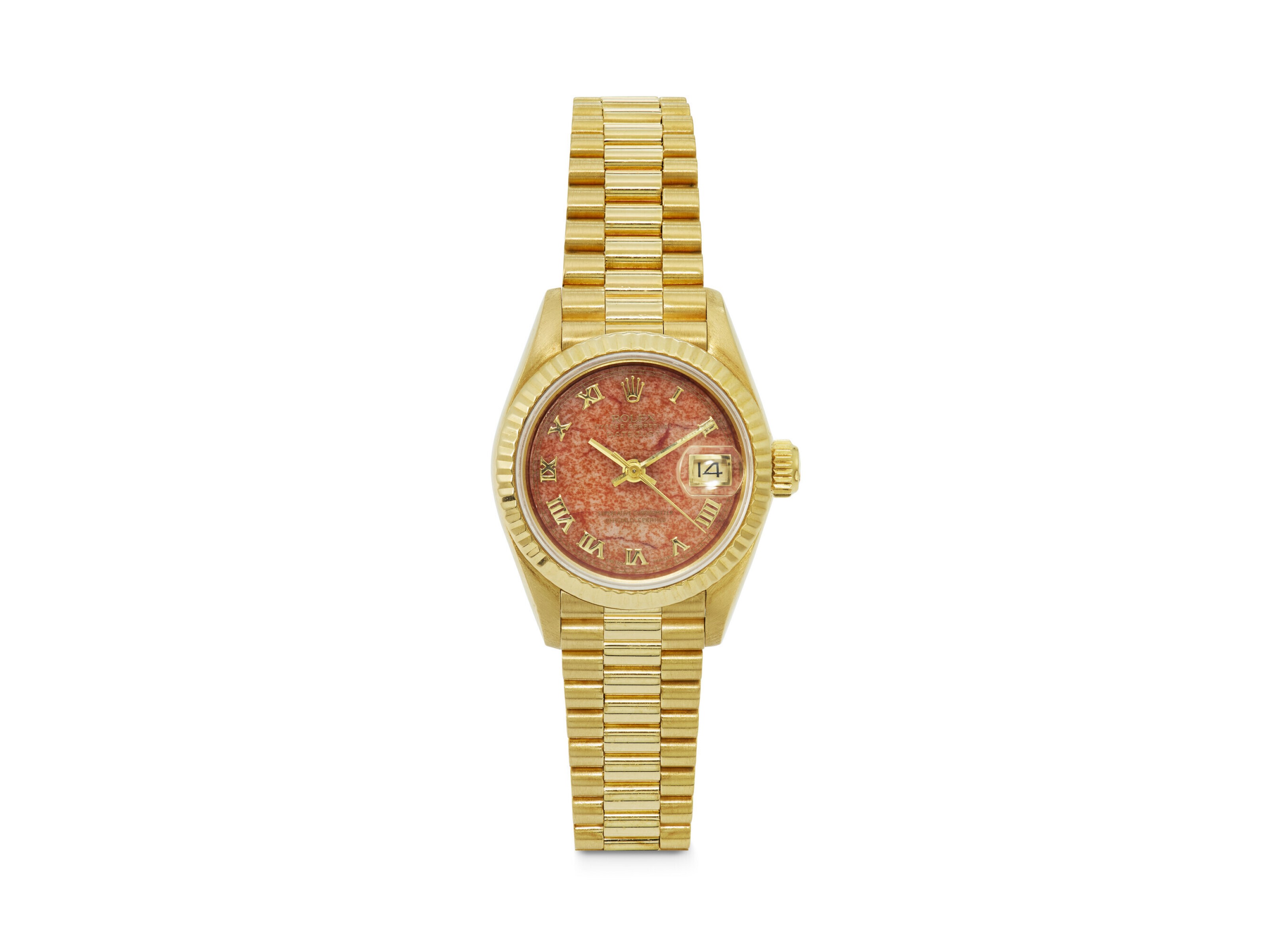 A gold wristwatch with a reddish marble dial and Roman numeral hour markers.