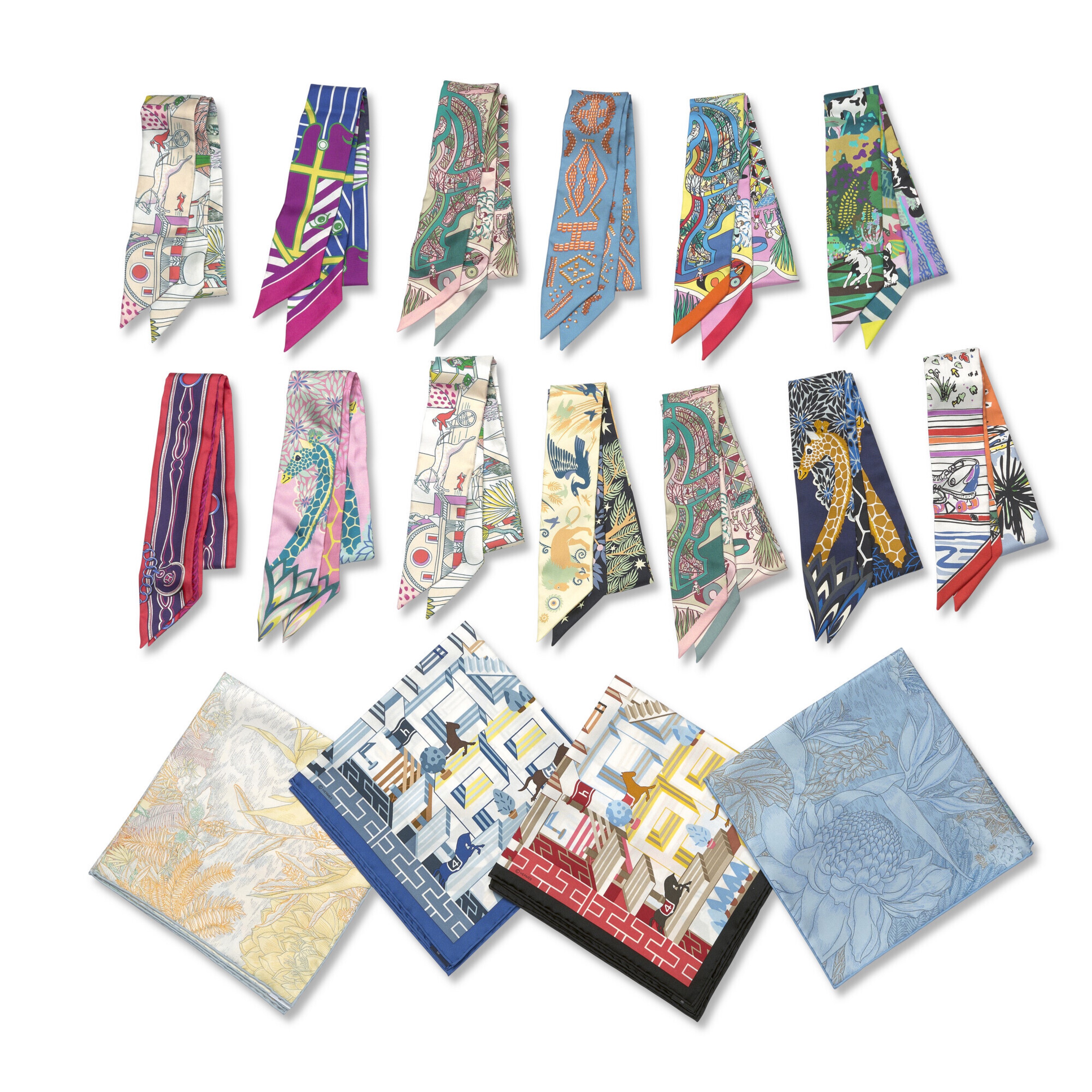 A collection of colorful, patterned silk scarves and pocket squares displayed on a white background.