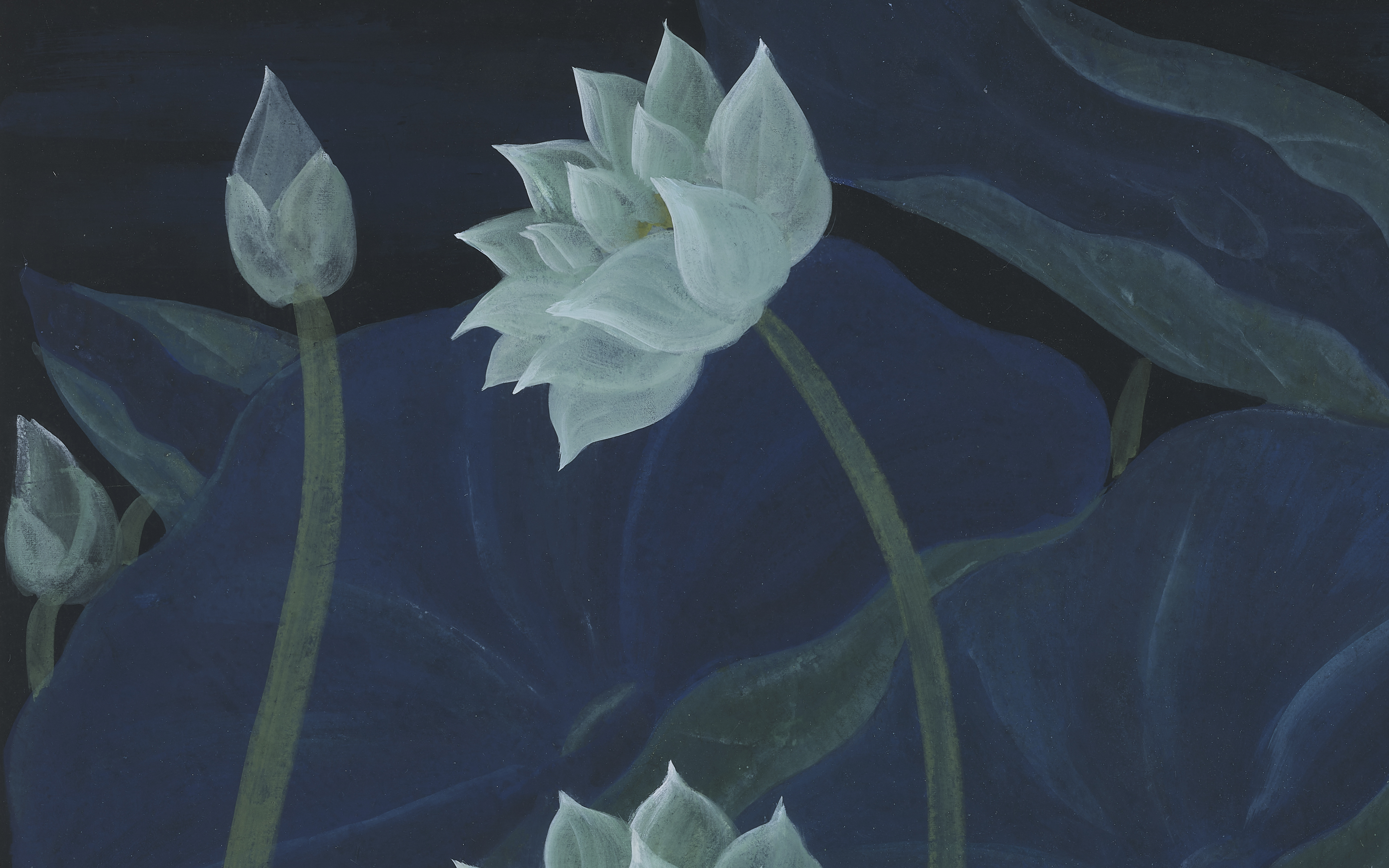 A cityscape featuring several modern skyscrapers under a blue sky, with prominent building signage.