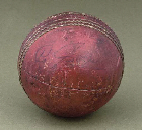 A RED LEATHER "SPECIAL COUNTY" CRICKET BALL | Christie's