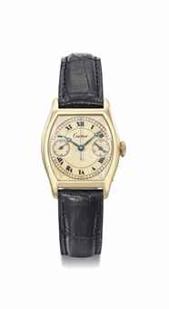Cartier. A fine and extremely rare 18K gold tonneau-shaped single-button chronograph