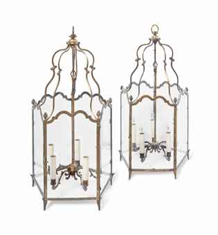 A PAIR OF BRASS AND GLASS HALL LANTERNS