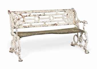 A WHITE-PAINTED CAST IRON GARDEN SEAT