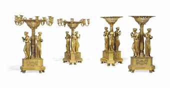 A PAIR OF EMPIRE ORMOLU CENTREPIECES AND A FURTHER MATCHING PAIR
