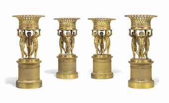 A SET OF FOUR FRENCH ORMOLU FIGURAL CENTREPIECES