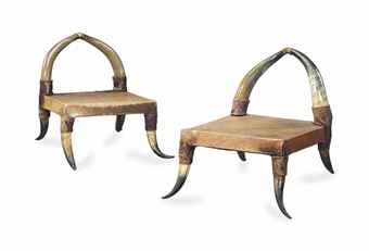 A PAIR OF FRENCH COW HORN AND HIDE LOW CHAIRS