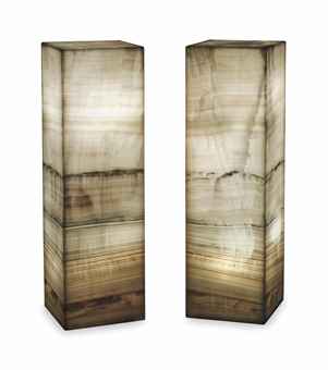 A PAIR OF INTERNALLY-LIT ONYX PEDESTALS