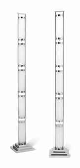 A PAIR OF ART DECO-STYLE OPAQUE WHITE GLASS-MOUNTED CHROME FLOOR LAMPS
