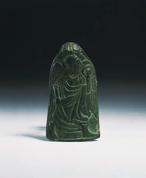 AN ETRUSCAN BRONZE HANDLE TERMINAL