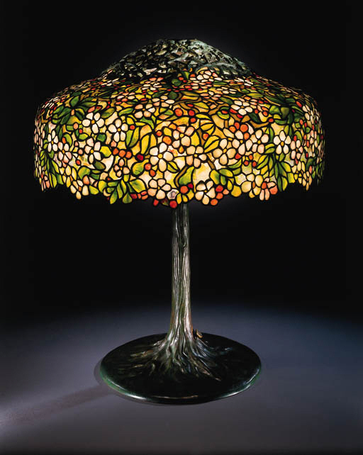 A FINE 'CHERRY BLOSSOM' LEADED GLASS AND BRONZE TABLE LAMP , TIFFANY STUDIOS Christie's