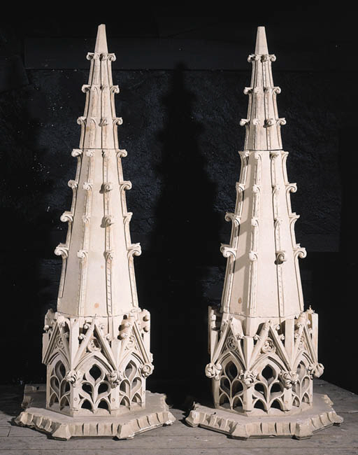 A pair of GothicRevival crocketted carved stone finials , IN THE