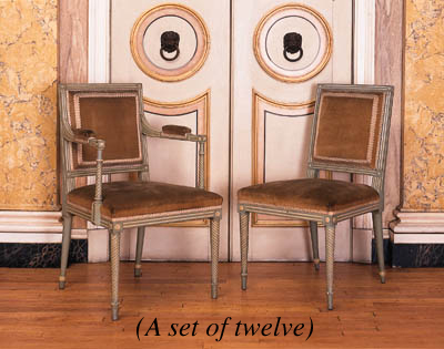 A SET OF TWELVE PALE-GREEN AND WHITE-PAINTED DINING CHAIRS