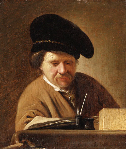 A Man in a black Cap reading at a Table 
