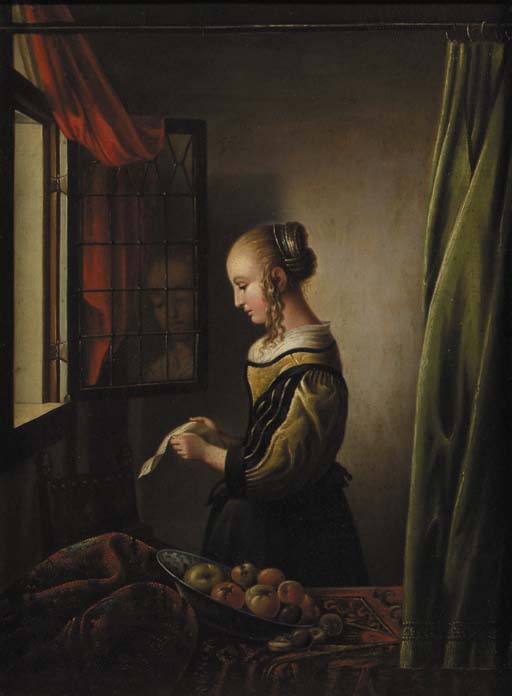 A girl reading a letter at an open window 
