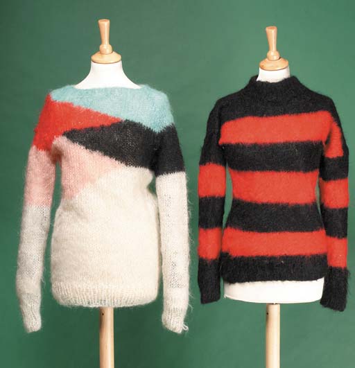 A MOHAIR JUMPER, LOOSELY KNITTED IN IVORY WITH BLUE, RED, BLACK