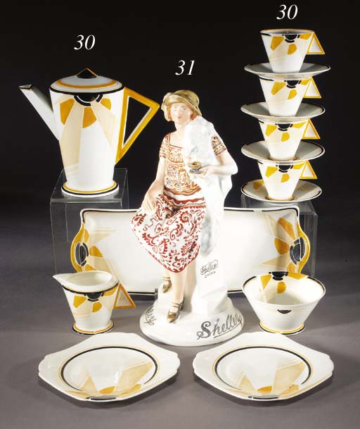 'SHELLEY GIRL' A RARE SHELLEY PORCELAIN ADVERTISING FIGURE CIRCA 1925