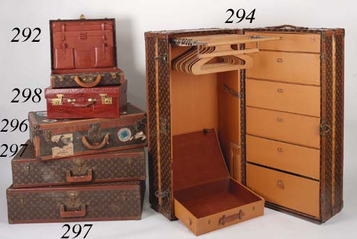 A Louis Vuitton Wardrobe Trunk Covered In Lv Monogram Canvas And