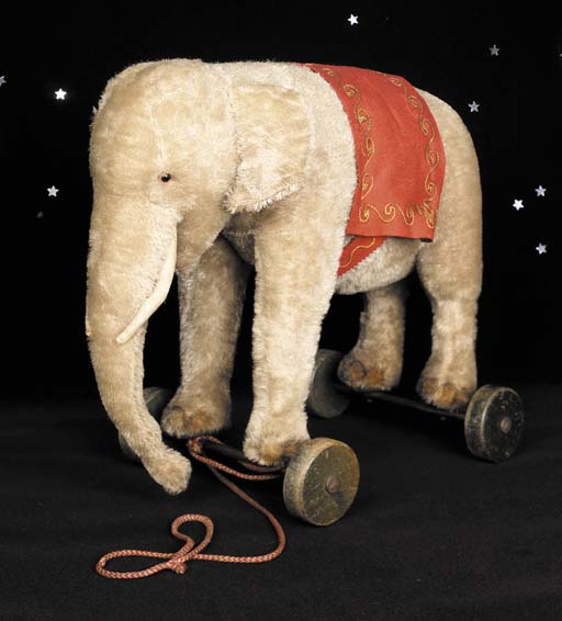 A Steiff elephant on wheels | Christie's