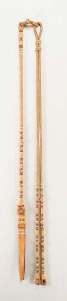 A SET OF THREEE COLOR RAWHIDE REINS AND ROMAL BY LUIS B. ORTEGA