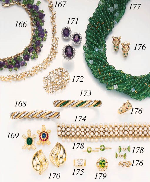 A DIAMOND, EMERALD AND GOLD BRACELET