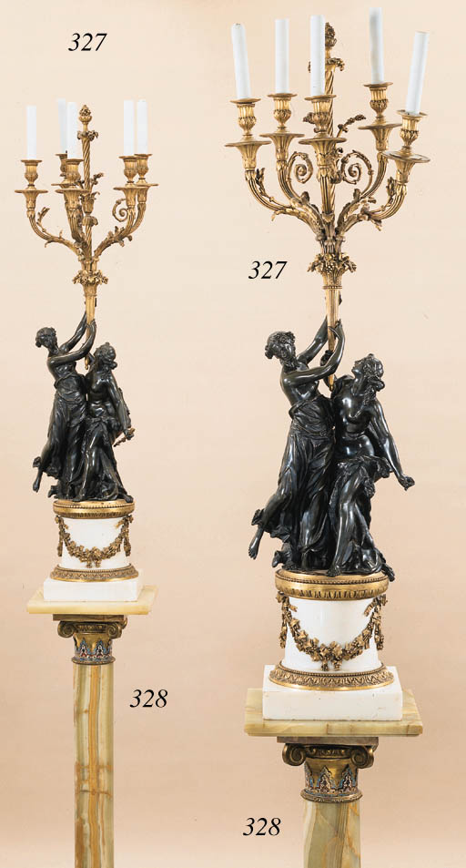 A German Renaissance-style repousse silver and carved ivory charger**