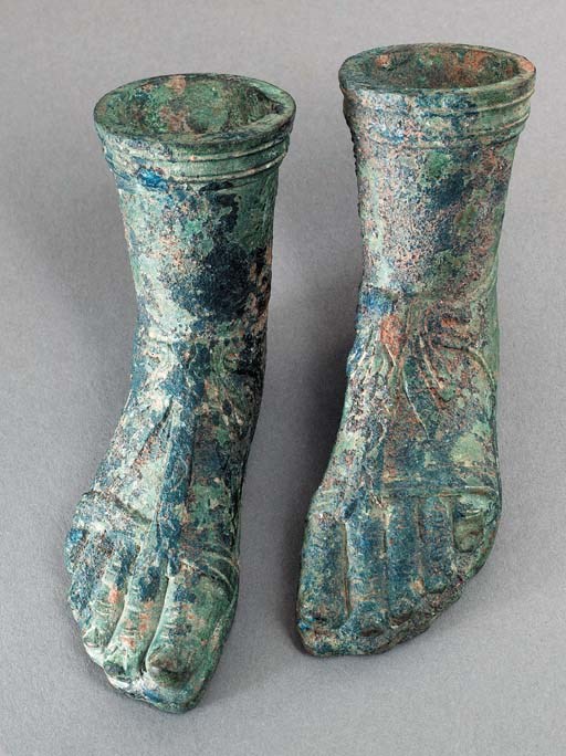 TWO ROMAN BRONZE FEET , CIRCA 1ST3RD CENTURY A.D. Christie's