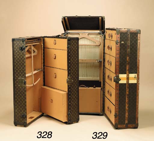 A Louis Vuitton Wardrobe Trunk Covered In Lv Monogram Canvas With
