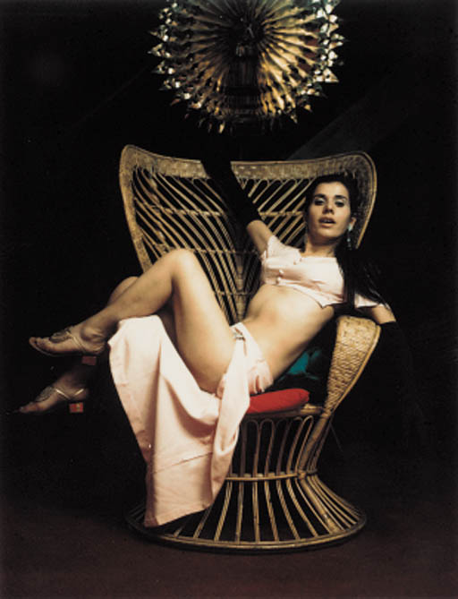 Carlo Mollino (1905-1973), Polaroid, c. 1963-65. Model reclining in wicker chair. Sold for &pound;4,700 on 23 October 2001 at Christie's in London