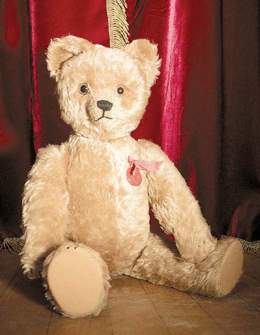 A miniature Schuco teddy bear for British Petroleum, wearing a crown