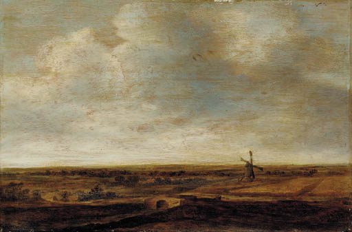 An extensive landscape with a windmill 
