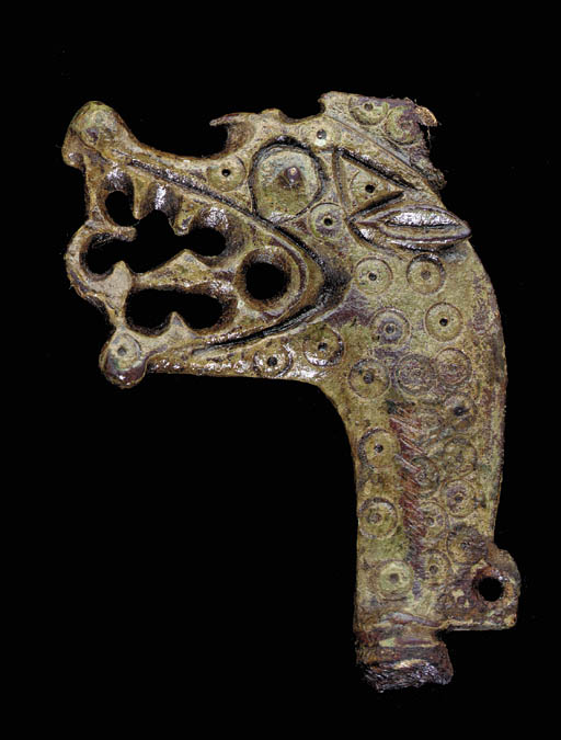 A VIKING BRONZE DRAGON HEAD PENDANT , CIRCA 900 A.D. Christie's